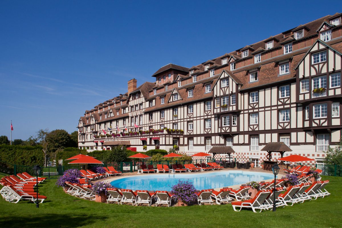 The heated outdoor pool at Hotel du Golf Barriere, Deauville, Normandy, France. Golf Planet Holidays
