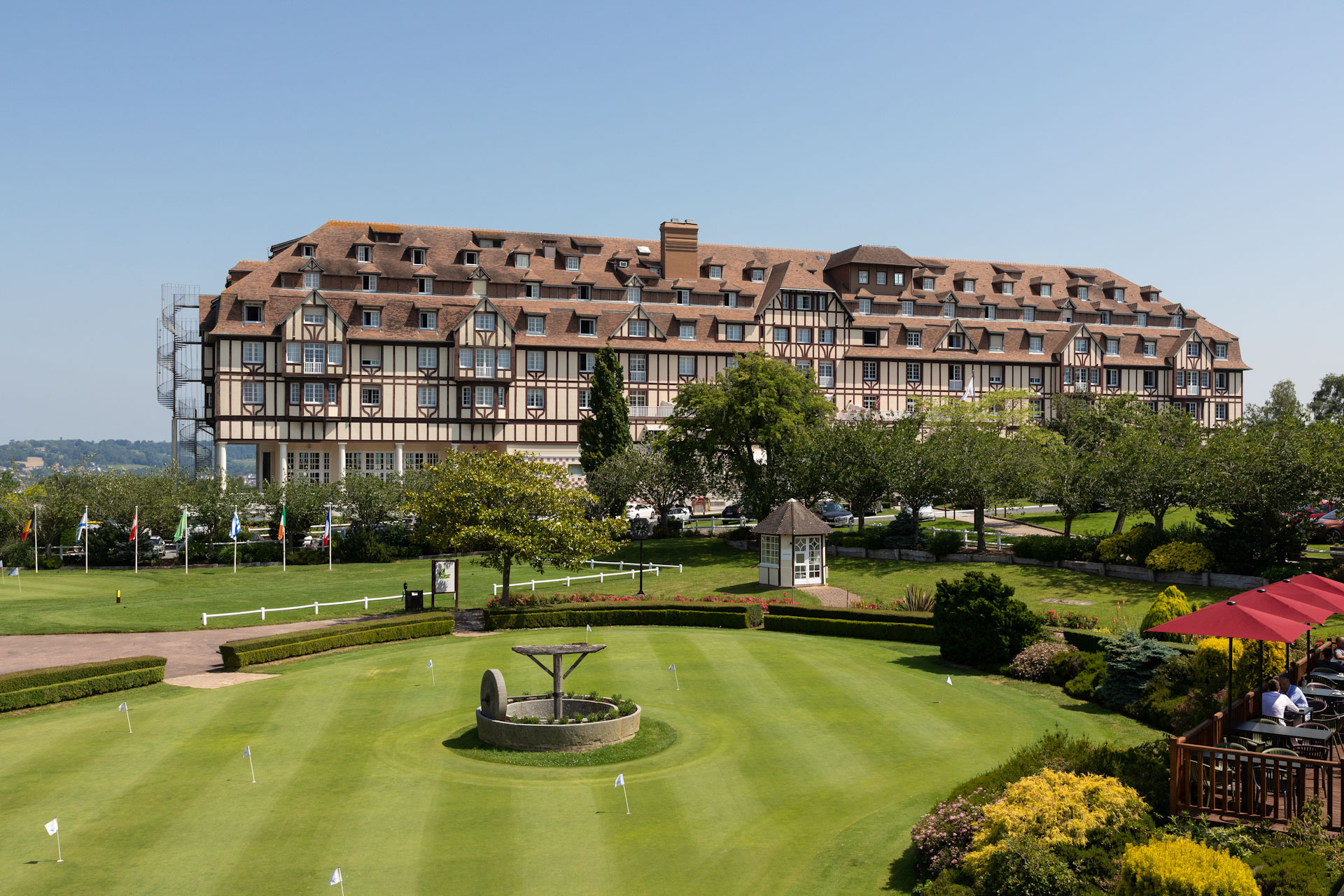 The exterior of Hotel du Golf Barriere, Deauville, France from the golf course