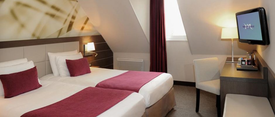 A twin bedroom at Mercure Omaha Beach, Port en Bessin, Normandy, France