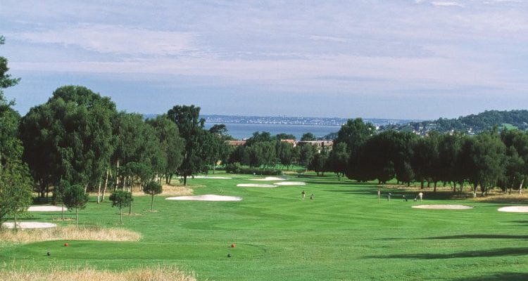 Heading down the fairway on the red and white course at New Golf Deauville, Normandy, France