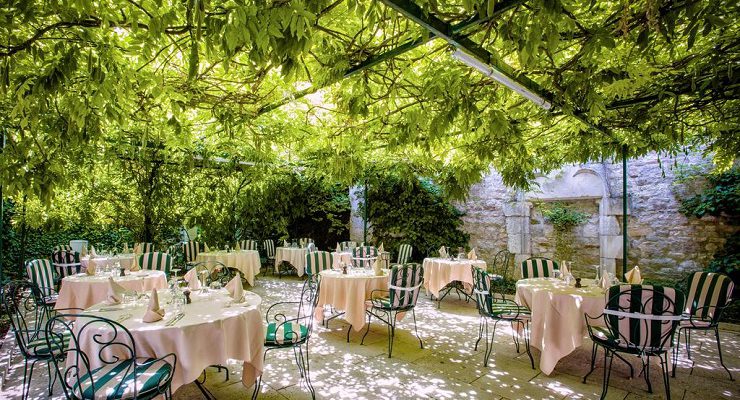 Outdoor dining at Chateau de Gilly, near Beaune, Burgundy, France