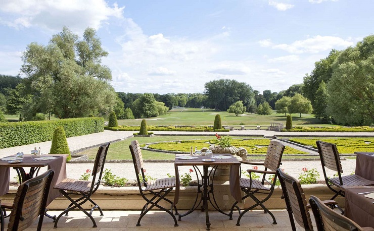 Dining on the terrace at Chateau d'Augerville, France