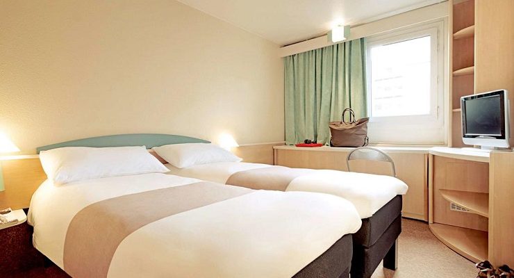 A twin bedroom at Hotel Ibis Epernay Centre ville, Champagne, France