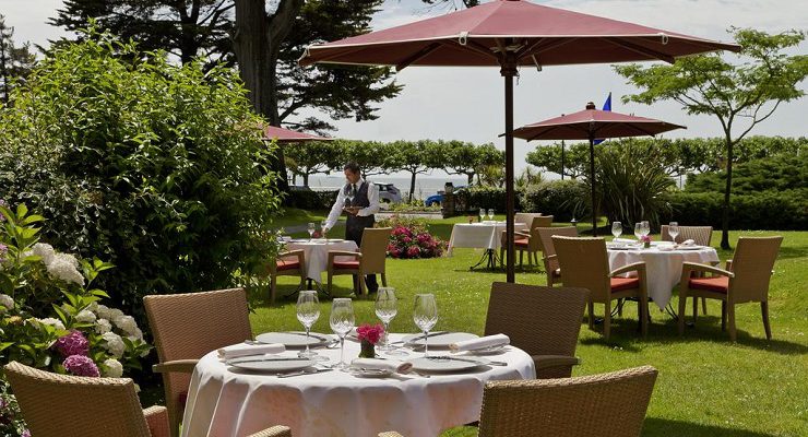 Dining in the garden at Relais et Chateaux Castel Marie Louise, La Baule, Brittany, France