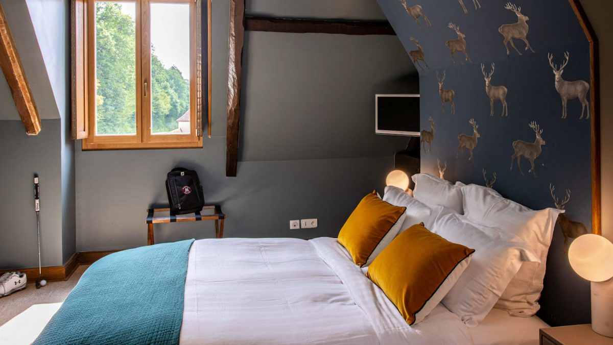 A bedroom at Domaine de Roncemay, Burgundy, France. Golf Planet Holidays