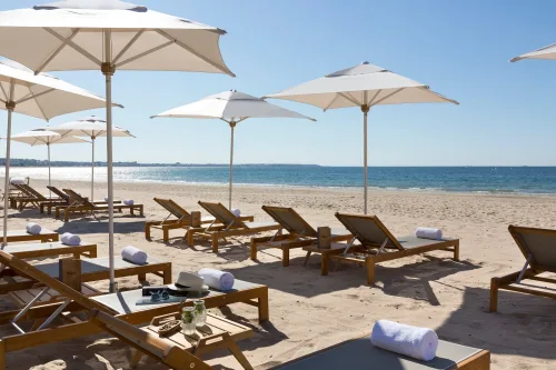 On the beach at Hotel Barriere Le Royal, La Baule, Brittany, France. Golf Planet Holidays.