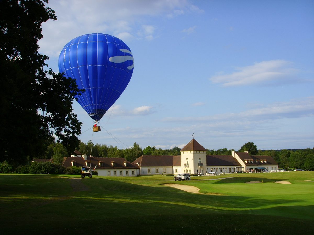 Hot air balloon over Apremont Golf Club, around Paris, France