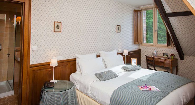 A double bedroom at Domaine de Roncemay Hotel, Auxerre, France