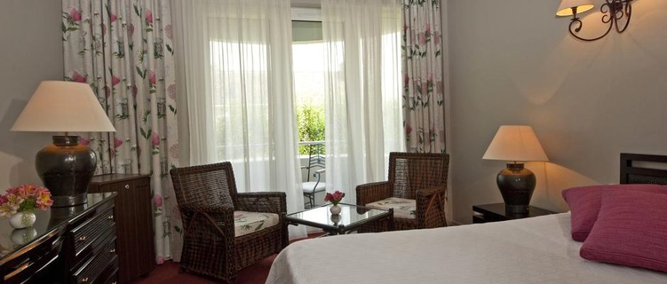 Light and space in the bedrooms at Grand Hotel de Solesmes, Loire, France
