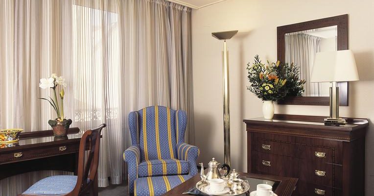 Colourful bedrooms at Grand Hotel de Solesmes, Loire, France