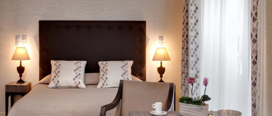 A modern double bedroom at Grand Hotel de Solesmes, Loire, France