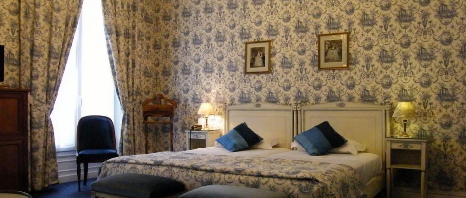A double bedroom at Grand Hotel des Templiers, Reims, Champagne, France