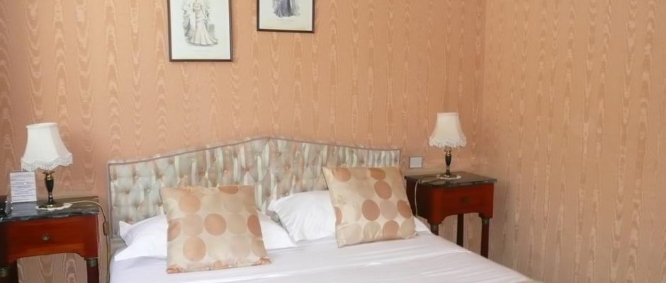 A double bedroom at Grand Hotel des Templiers, Reims, Champagne, France