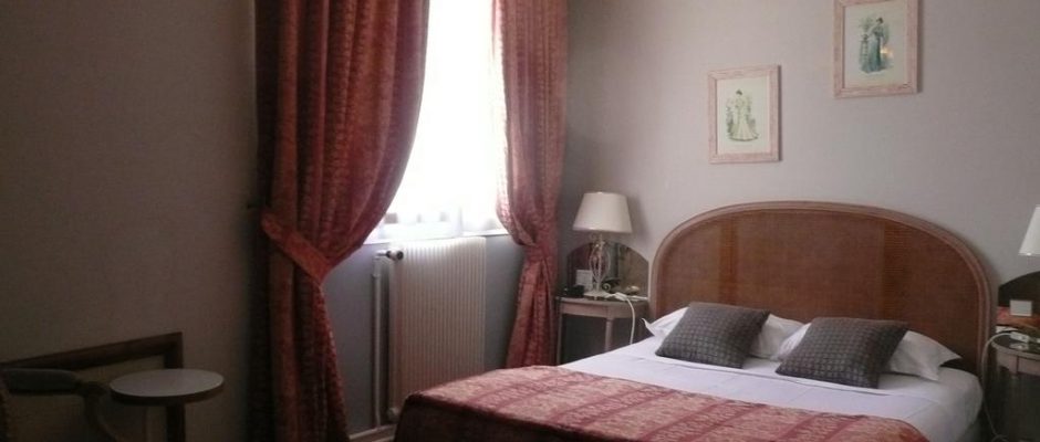 A double bedroom at Grand Hotel des Templiers, Reims, Champagne, France