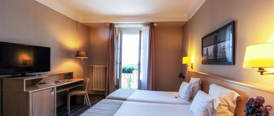 A twin bedroom at Grand Hotel, Strasbourg, France