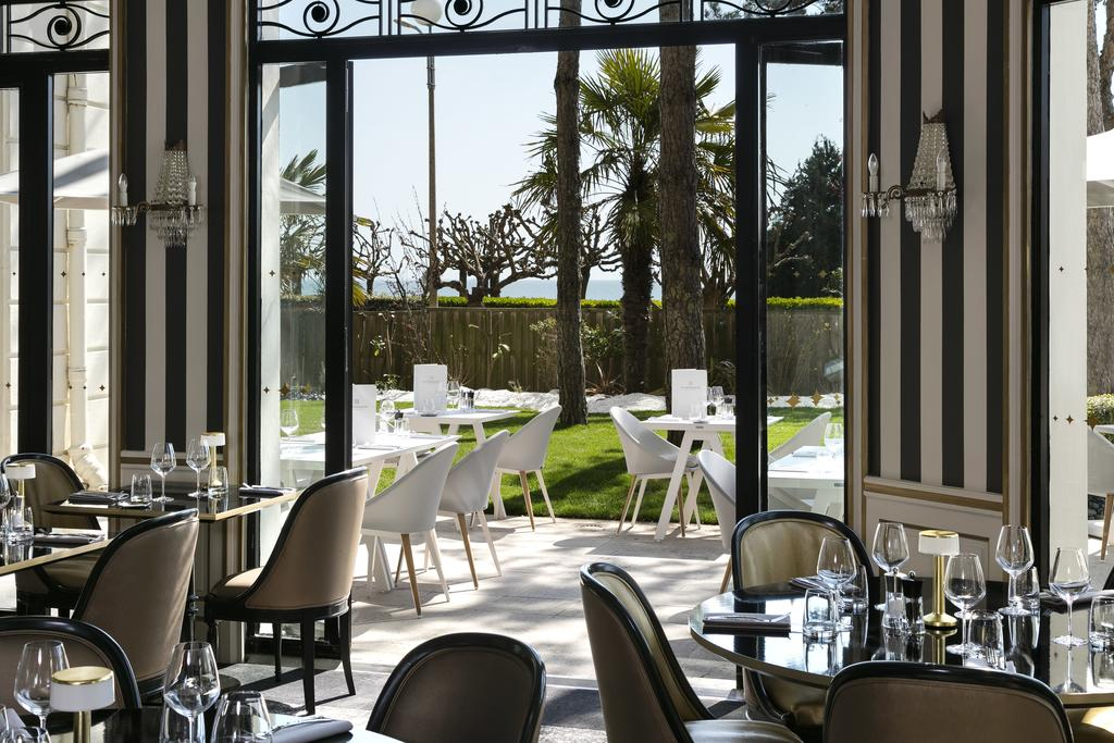 Dine indoors or out at Hotel Barriere l’Hermitage, La Baule, Brittany, France