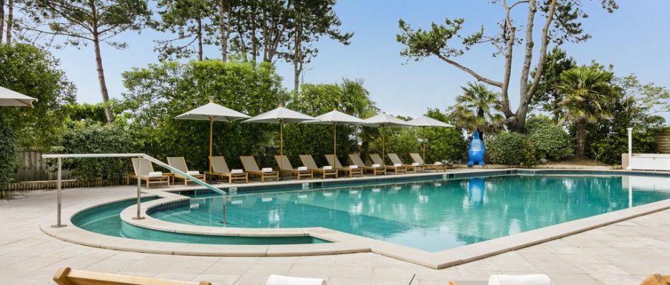 Relax by the pool at Hotel Barriere lâ€™Hermitage, La Baule, Brittany, France