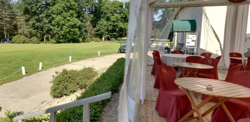 Outdoor dining at Champ de Bataille Golf Club, Normandy, France