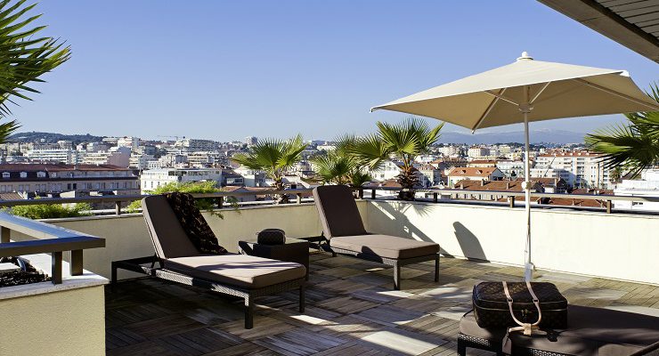 Terrace balcony at Le Gray d'Albion Hotel, Cannes, South of France. Golf Planet Holidays.
