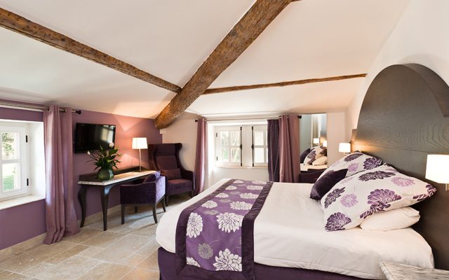 Timber ceiling in a bedroom at Moulin de Vernegues, Mallemort, France