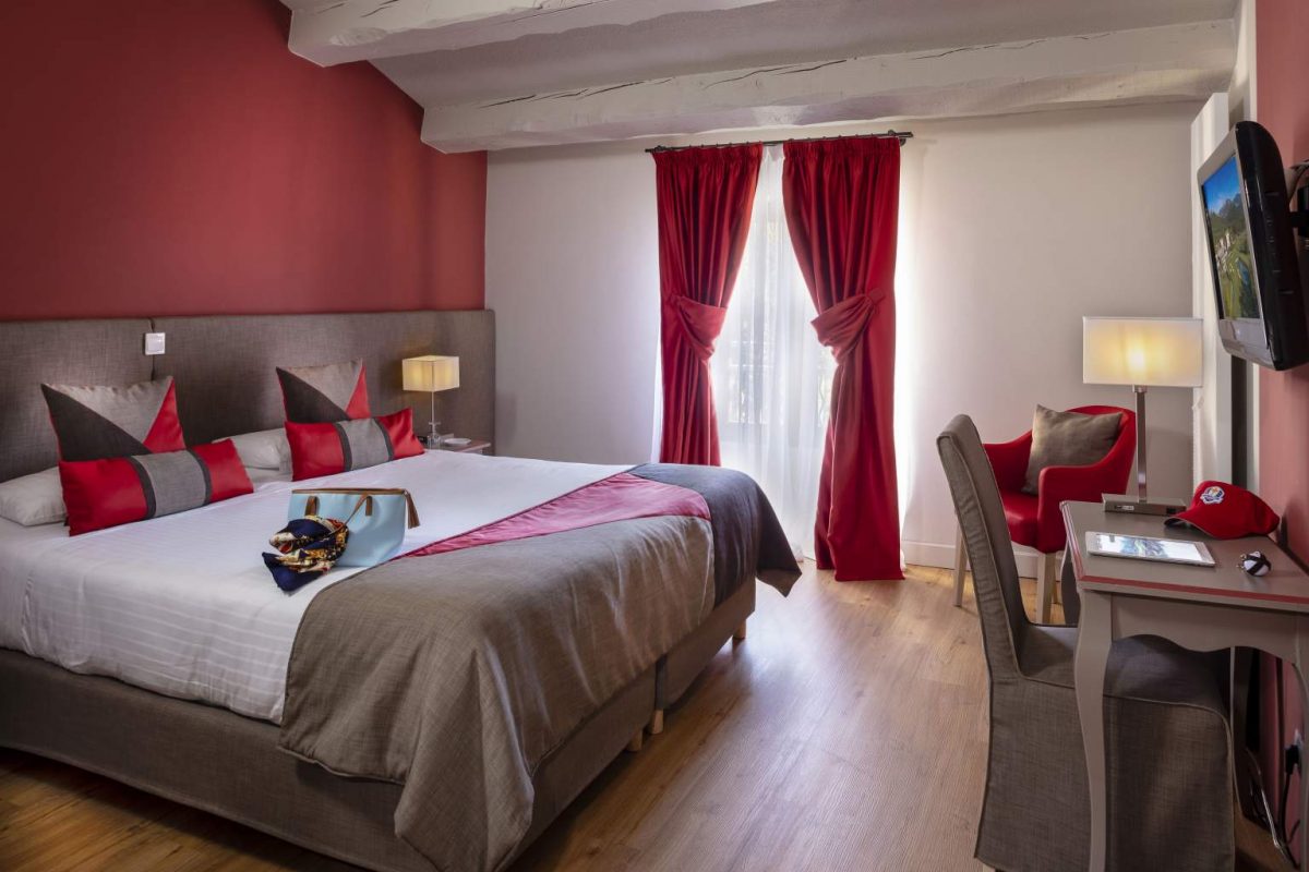 A bedroom at Golf Chateau de Taulane, near Grasse, South of France. Golf Planet Holidays.