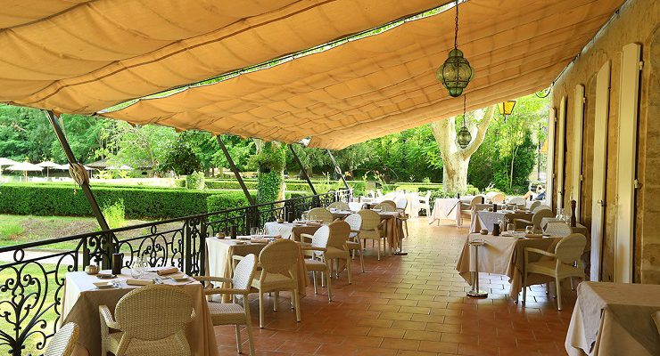On the terrrace at Moulin de Vernegues, Mallemort, Provence. Golf Planet Holidays.