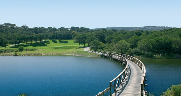 Bridge over the troubling water at Almenara Golf Club, Sotogrande, Costa del Sol, Spain. Golf Planet Holidays
