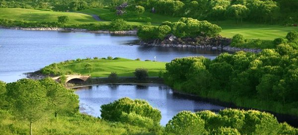 Carry the water at Almenara Golf Course, Costa del Sol, Spain. Golf Planet Holidays