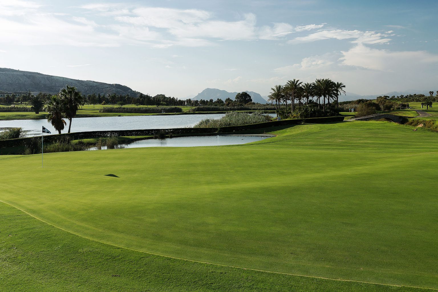 On the green at La Finca Golf Course, Alicante, Spain