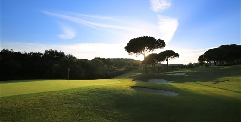 Shadows over the green at La Reserva de Sotogrande Golf Course. Costa del Sol, Spain. Golf Planet Holidays.