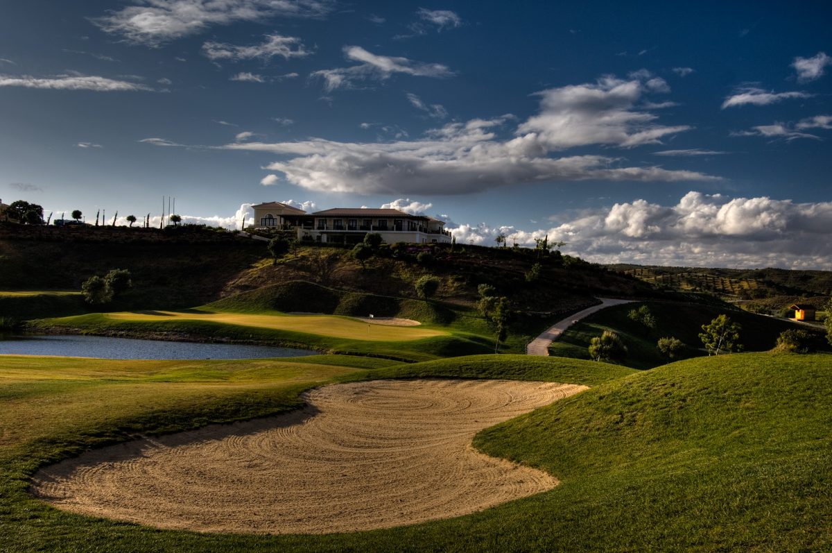 The clubhouse and 18th hole at Quinta do Vale golf course, Eastern Algarve