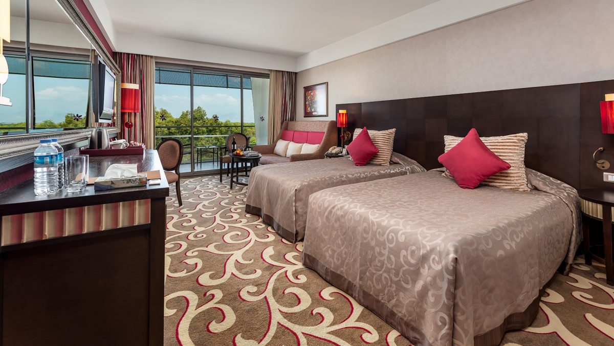 A twin bed classic room at Cornelia Diamond Golf Resort, Belek, Turkey