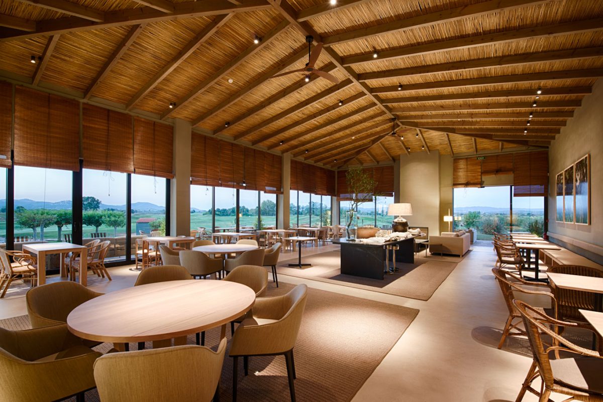Enjoy a drink in the bar at Hotel Terraverda at Emporda Golf Girona with panoramic views over the course