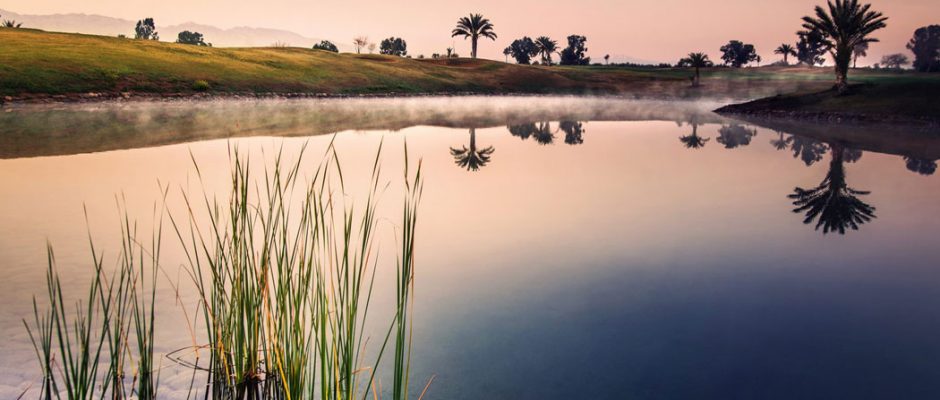 Reflections over the water at Amelkis Golf Club, Marrakech, Morocco