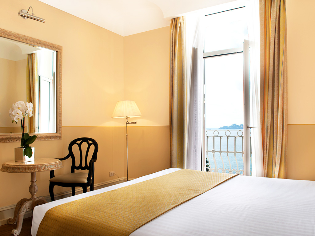 A Deluxe bedroom with lake view at Grand Hotel Bristol, Stresa, Italy