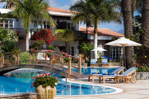 Relax by the pool at Seaside Grand Hotel Residencia, Gran Canaria