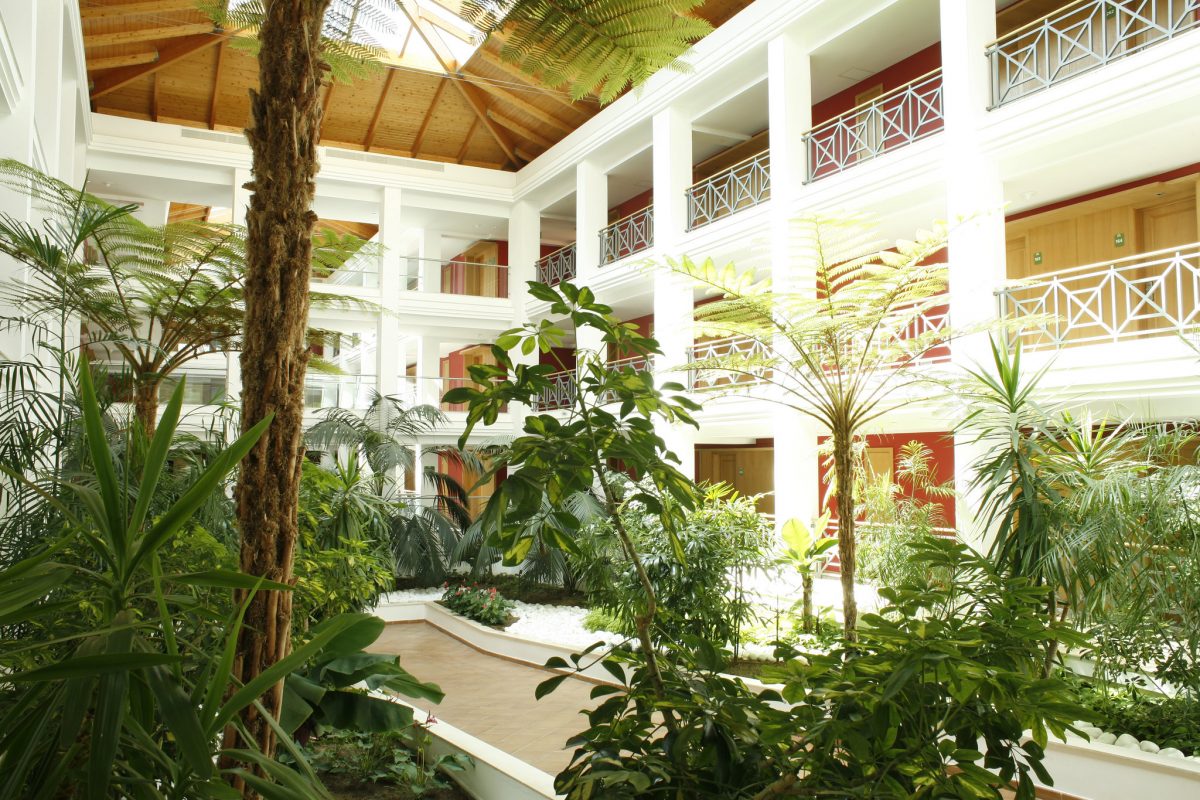 The tree filled atrium at Onyria Quinta da Marinha Hotel, Cascais, Portugal