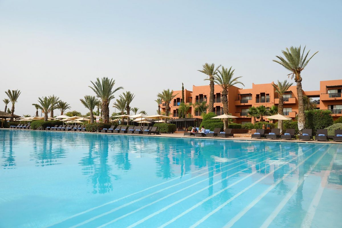The large swimming pool at the Kenzi Menara Palace hotel, Marrakech, Morocco