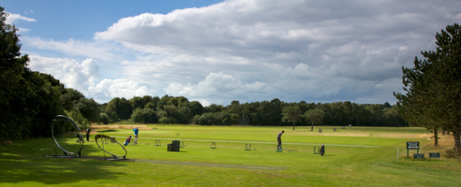 On the practice ground at Moortown Golf Club, Leeds, Yorkshire, England
