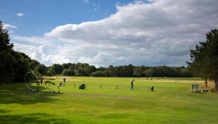 On the practice ground at Moortown Golf Club, Leeds, Yorkshire, England