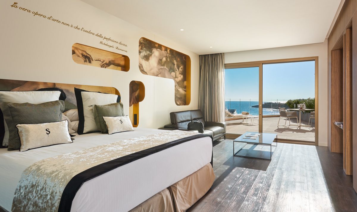 Suite bedrooms at Pure Salt Port Adriano Calvia have a large terrace or balcony