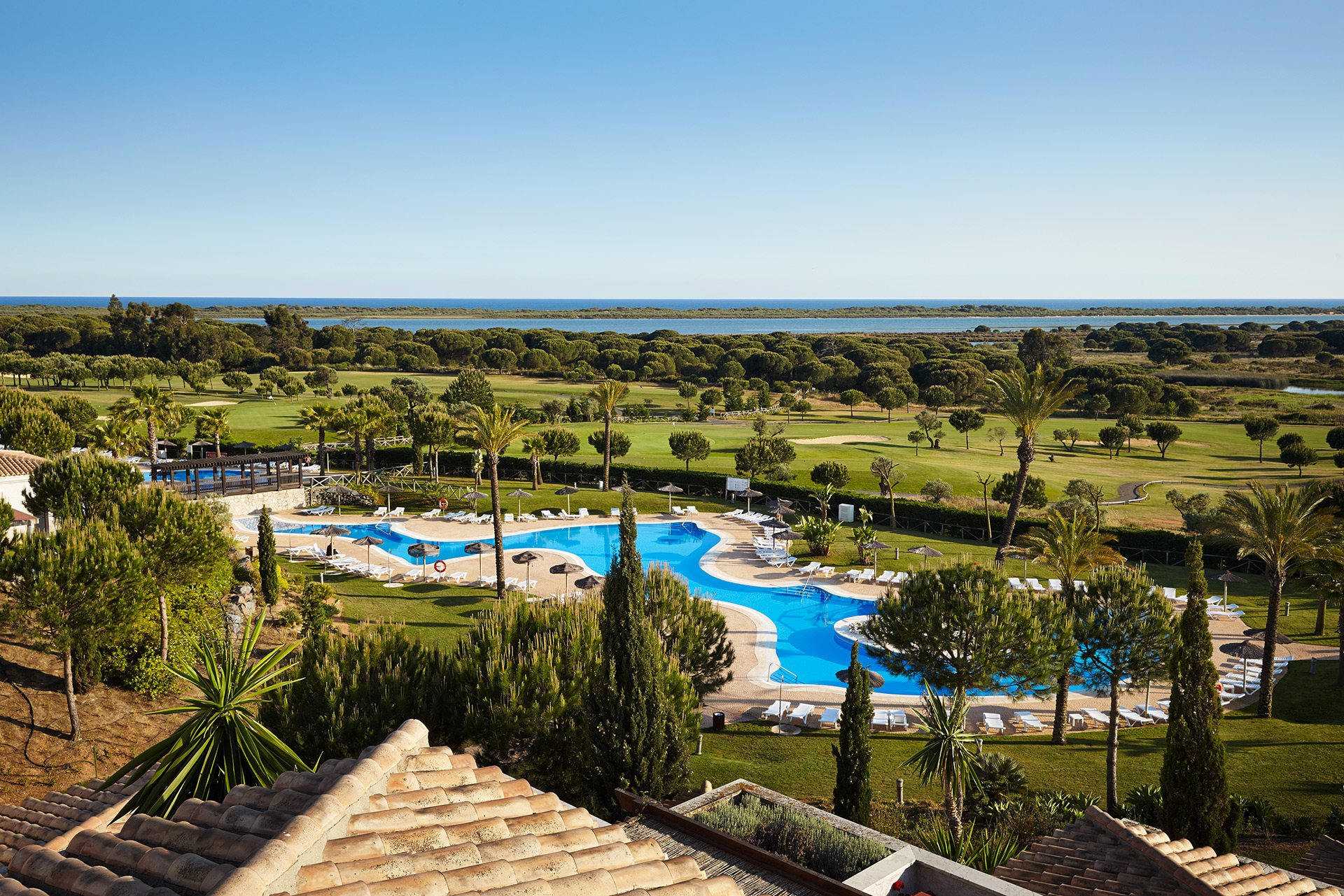 View of the El Rompido golf courses from Precise Hotel, Spain