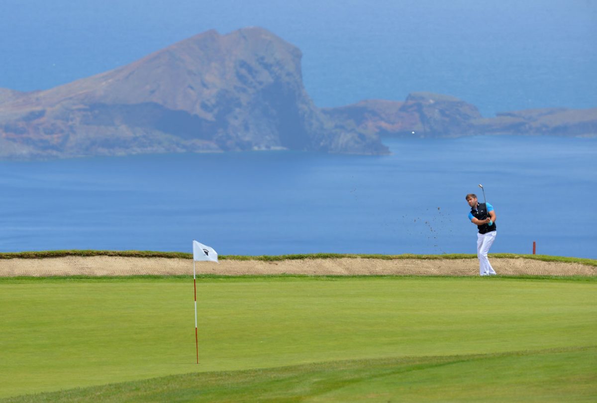 Robert Rock hits out of a bunker on day one of the Madeira Islands Open at Santo da Serra golf course