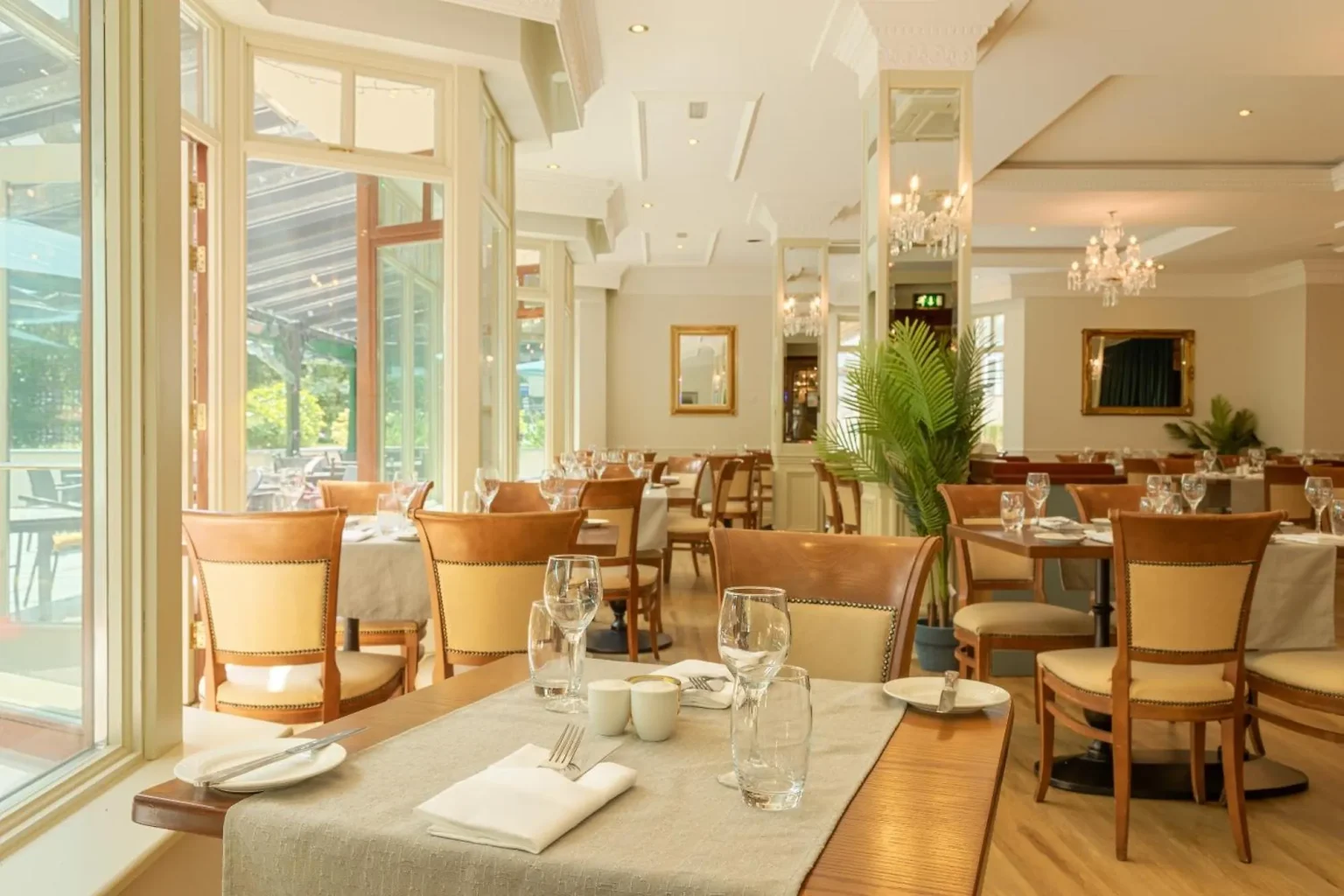 The bright conservatory restaurant at The Ardilaun Hotel, Galway