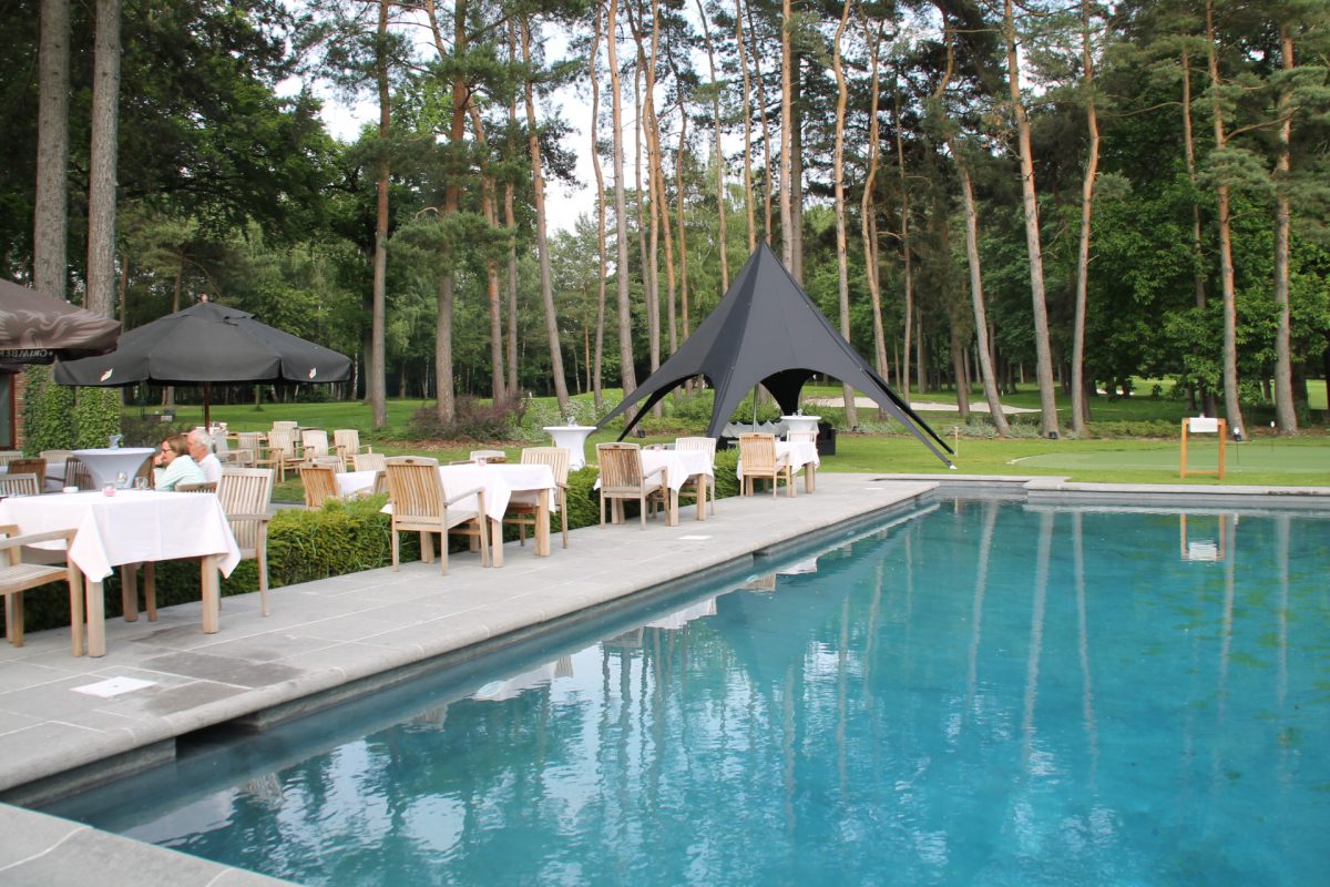 Enjoy lunch by the pool at Royal Bercuit Golf Club, Waterloo, Belgium