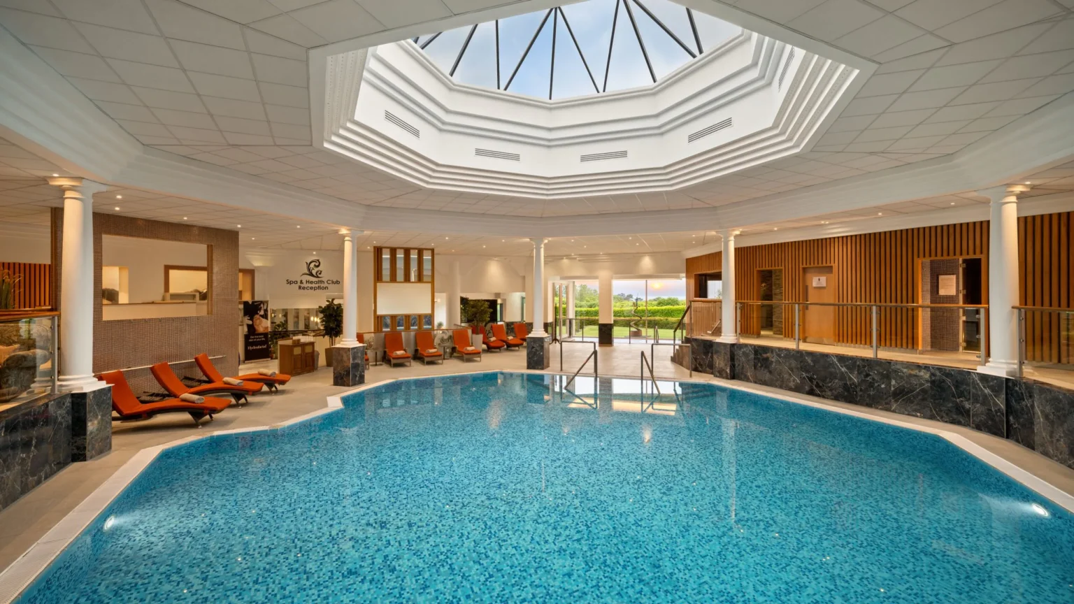The indoor spa pool at Culloden Estate and Spa under an octagonal glass skylight