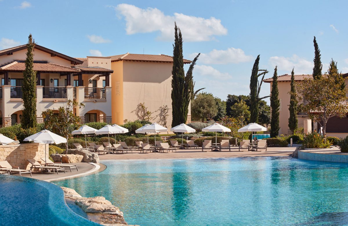 Relax by the pool at Aphrodite Hills Hotel by Atlantica, Paphos, Cyprus