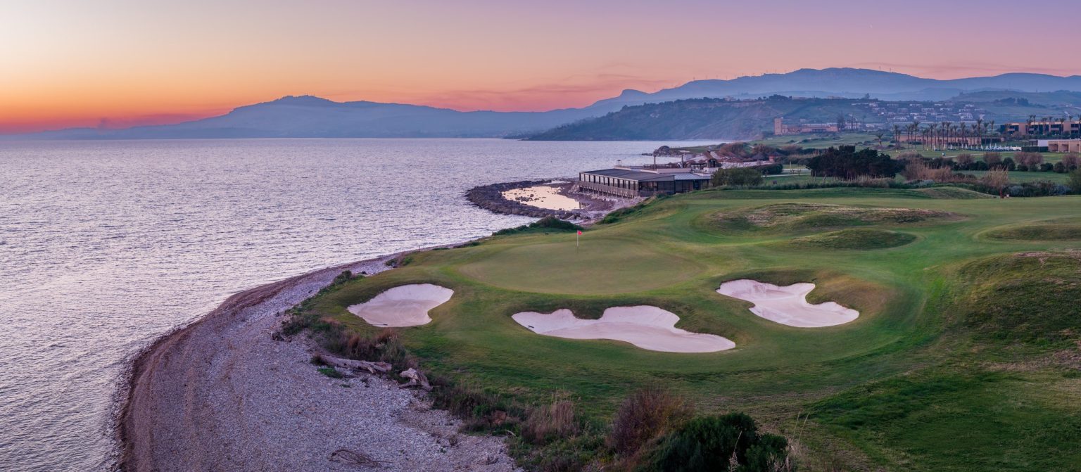 Aerial view of the Verdura golf course beside the Mediterranean at sunset