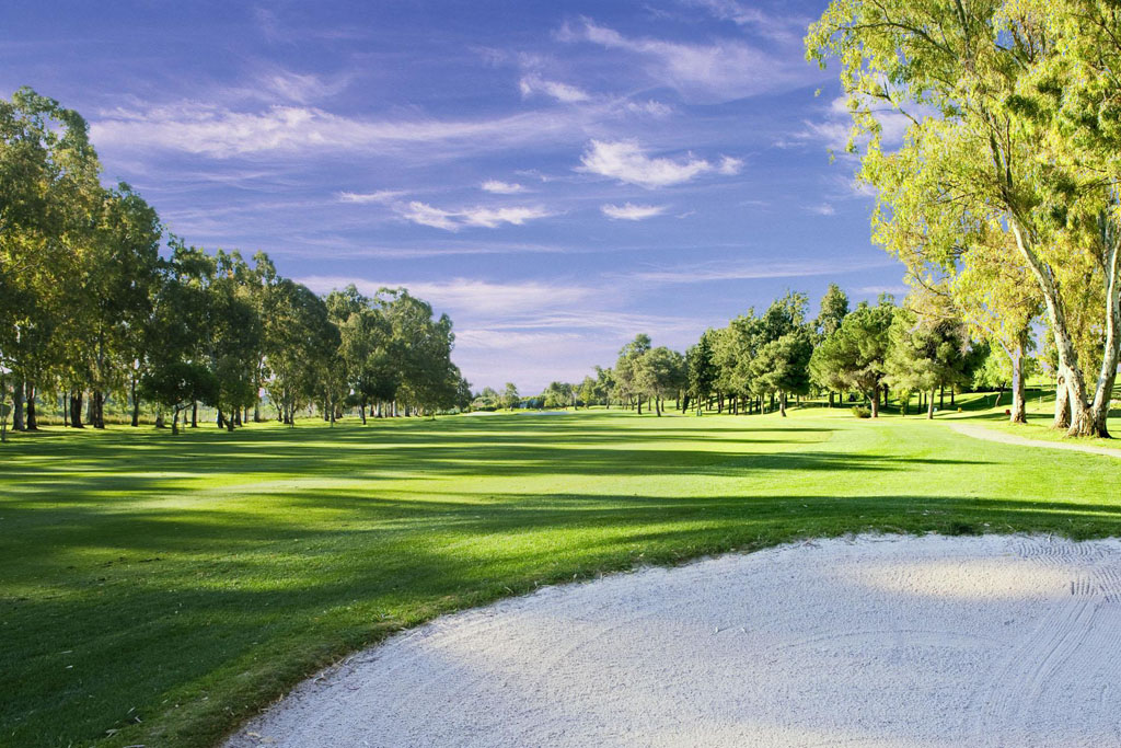 Swing hard at Atalaya Golf and Country Club, Marbella, Costa del Sol, Spain. Golf Planet Holidays.