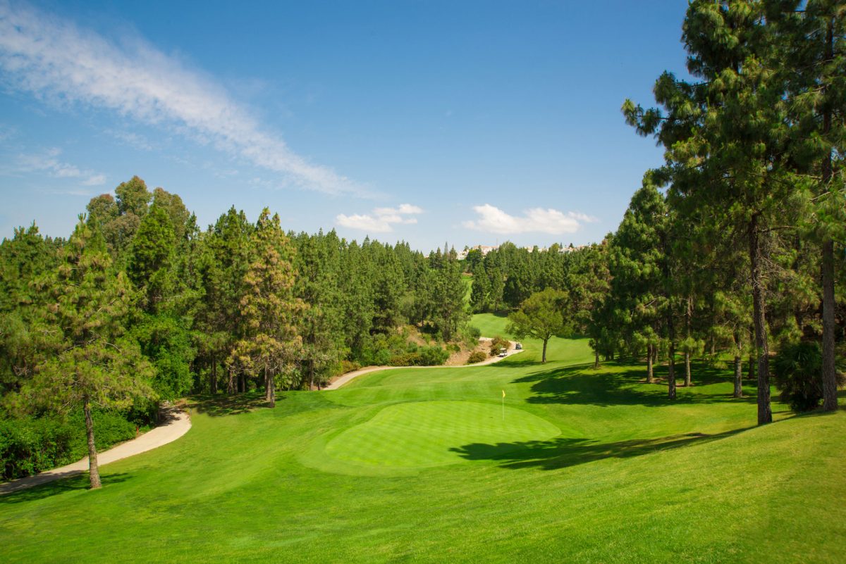 You'll be pleased to reach this green at Chaparral Golf Course, Marbella, Costa del Sol, Spain. Golf Planet Holidays.